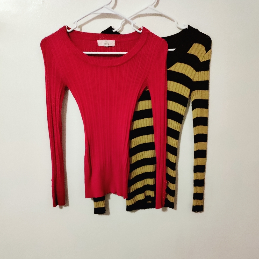 Two, fitted long sleeve shirts